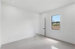 1122 S Edelweiss Street E, Lehigh Acres, FL 33974 - Photo 18