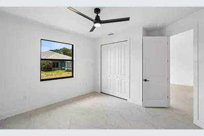 2406 Hightower Avenue S, Lehigh Acres, FL 33973 - Photo 12