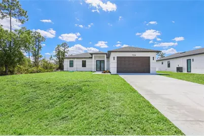 1124 S Edelweiss Street E, Lehigh Acres, FL 33974 - Photo 2