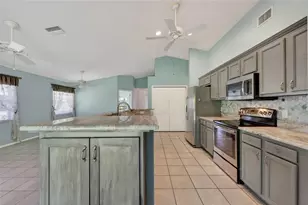 13440 SW Pembroke Cir N, Lake Suzy, FL 34269 - Photo 14