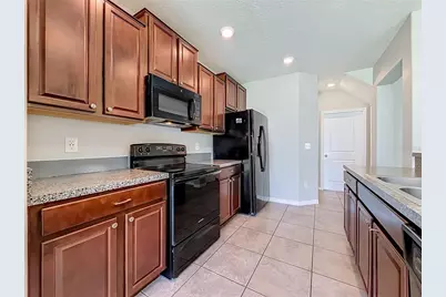 7405 Evening Primrose Court, Tampa, FL 33619 - Photo 14