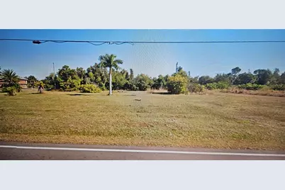 13736 Stringfellow Road, Bokeelia, FL 33922 - Photo 1