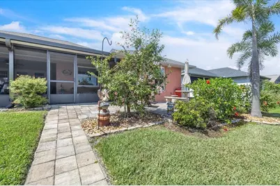 11614 SW Courtly Manor Drive, Lake Suzy, FL 34269 - Photo 34
