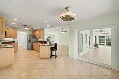 12001 SW Kingsway Circle, Lake Suzy, FL 34269 - Photo 8