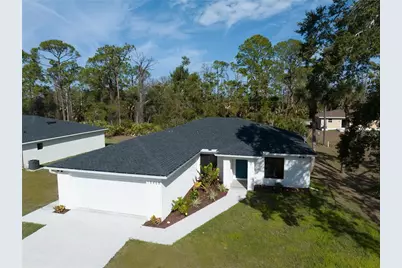 15468 Chamberlain Boulevard, Port Charlotte, FL 33953 - Photo 1