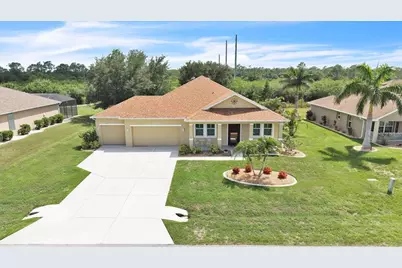 12933 SW Pembroke Circle S, Lake Suzy, FL 34269 - Photo 1