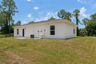 1120 Ravenswood St E, Lehigh Acres, FL 33974 - Photo 4
