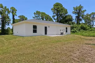 1120 Ravenswood St E, Lehigh Acres, FL 33974 - Photo 6