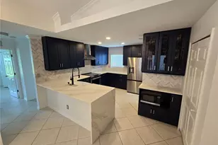 219 NW 25th Pl, Cape Coral, FL 33993 - Photo 2