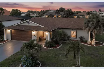 107 Peckham Street SW, Port Charlotte, FL 33952 - Photo 1