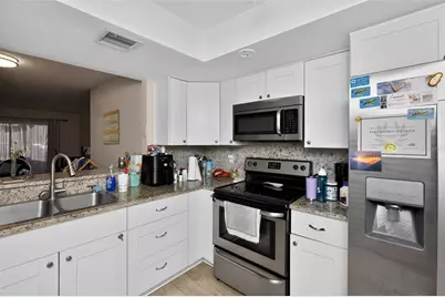2650 Countryside Boulevard #B104, Clearwater, FL 33761 - Photo 6