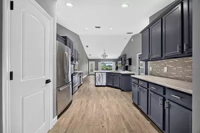 13443 SW Pembroke Circle N, Lake Suzy, FL 34269 - Photo 12