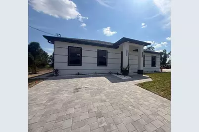717 Devon Street, Lehigh Acres, FL 33974 - Photo 1