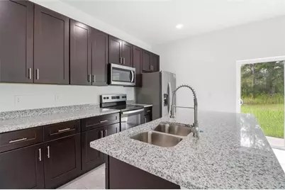 1569 W McNeal Drive, Citrus Springs, FL 34434 - Photo 16