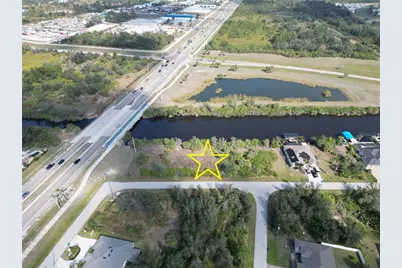 13914 Orbit Avenue, Port Charlotte, FL 33981 - Photo 1