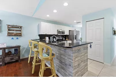 9850 Fiddlers Green Circle #228, Rotonda West, FL 33947 - Photo 12