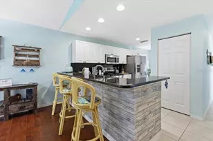 9850 Fiddlers Green Cir, Rotonda West, FL 33947 - Photo 12