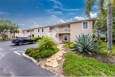9500 Fiddlers Green Circle #101, Rotonda West, FL 33947 - Photo 1