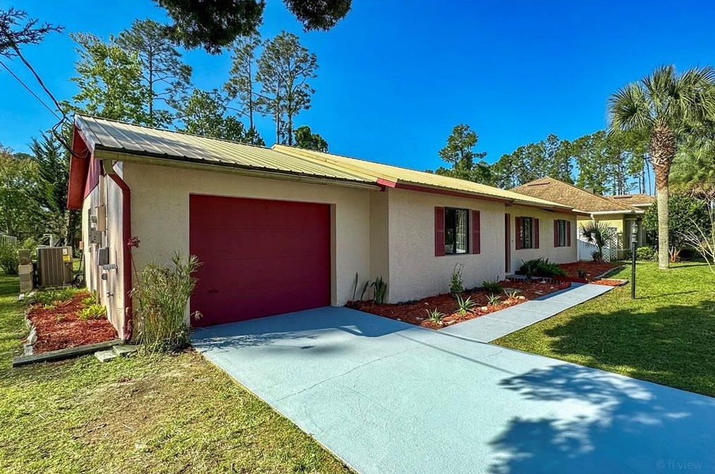 25 Ethan Allen Dr, Palm Coast, FL 32164-2906