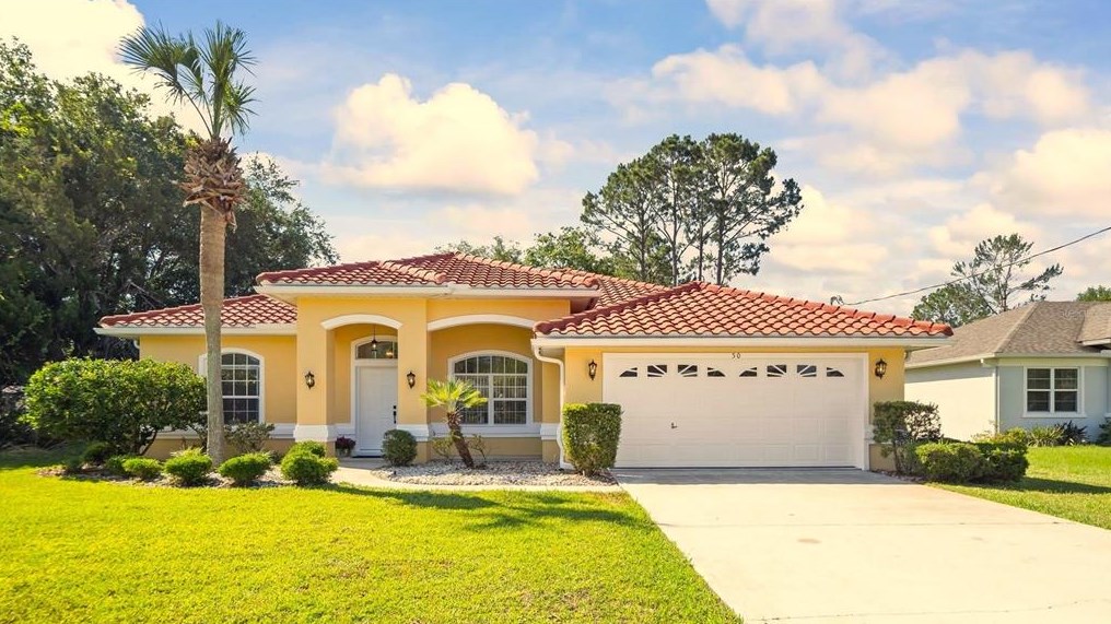 50 Persimmon Dr, Palm Coast FL  32164-7450 exterior
