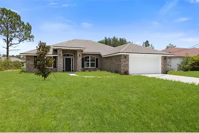 128 Bird Of Paradise Drive, Palm Coast, FL 32137 - Photo 2