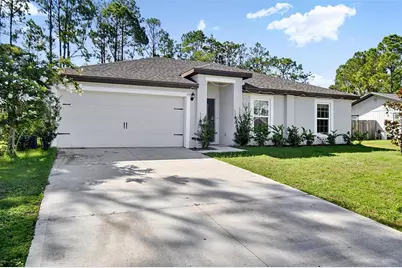 70 Pebble Beach Drive, Palm Coast, FL 32164 - Photo 1