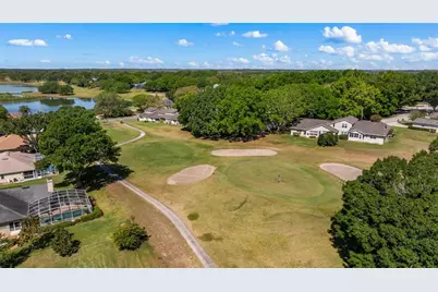 8925 Pebble Beach Place, Clermont, FL 34711 - Photo 28