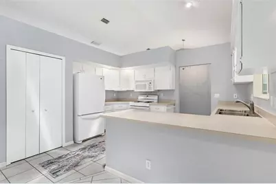 26608 Racquet Circle, Leesburg, FL 34748 - Photo 18