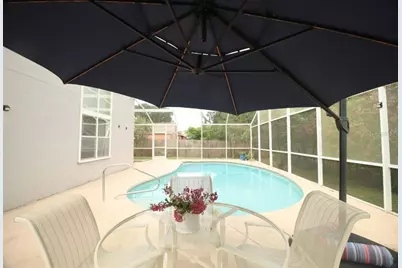 7938 Tumblestone Drive, Orlando, FL 32819 - Photo 30