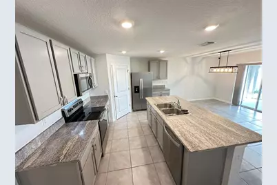 8557 Triumph Circle, Wildwood, FL 34785 - Photo 4