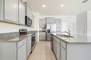 8128 Penrose Pl, Wildwood, FL 34785 - Photo 18