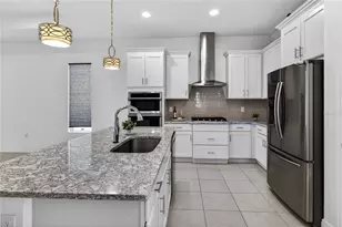 8677 Bridgeport Bay Cir, Mount Dora, FL 32757 - Photo 6