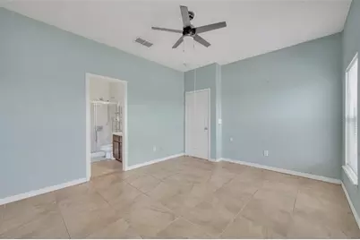 4718 Waterside Pointe Circle, Orlando, FL 32829 - Photo 16