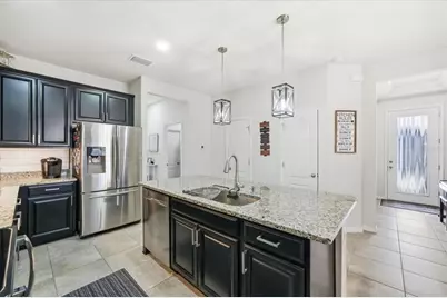 10591 Heron Hideaway Loop, Land O Lakes, FL 34638 - Photo 12