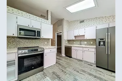 12208 Wedgefield Drive, Grand Island, FL 32735 - Photo 16