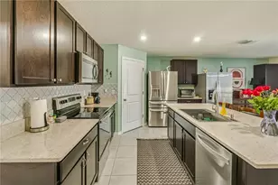 8669 Triumph Cir, Wildwood, FL 34785 - Photo 8