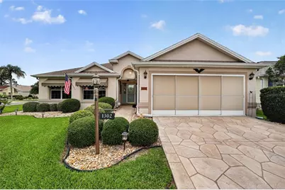 1302 Jimenez Court, The Villages, FL 32159 - Photo 1