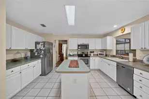 1302 Jimenez Ct, The Villages, FL 32159 - Photo 14
