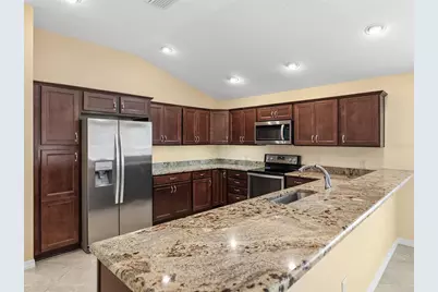 2877 Feustel Avenue, The Villages, FL 32163 - Photo 14