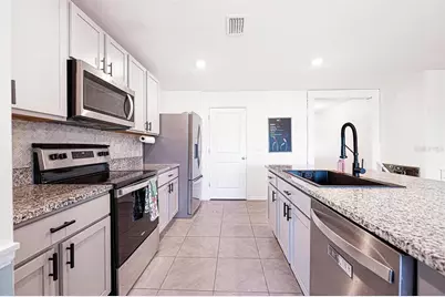 8574 Triumph Circle, Wildwood, FL 34785 - Photo 4