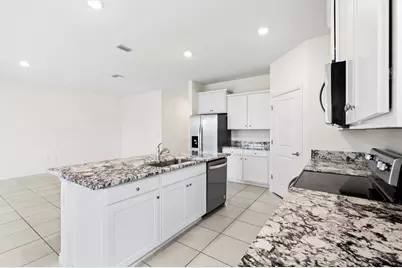 7926 Penrose Place, Wildwood, FL 34785 - Photo 10