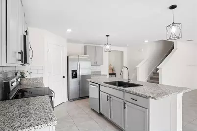 8673 Triumph Circle, Wildwood, FL 34785 - Photo 12