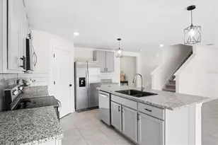 8673 Triumph Cir, Wildwood, FL 34785 - Photo 12