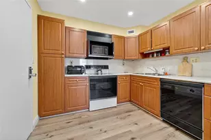 10777 W Sample Rd, Coral Springs, FL 33065 - Photo 12