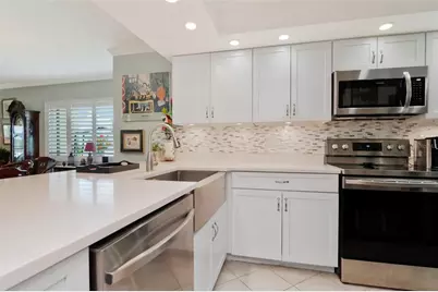 9450 Harbor Greens Way #308, Seminole, FL 33776 - Photo 12