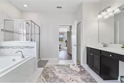 1420 Mickelson Court, Champions Gate, FL 33896 - Photo 32