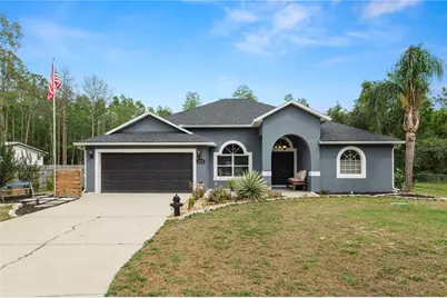 18231 Commonwealth Avenue N, Polk City, FL 33868 - Photo 1