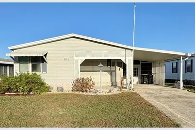 6133 Grand Oaks Drive SE, Winter Haven, FL 33884 - Photo 1