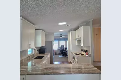 6114 Grand Oaks Drive SE, Winter Haven, FL 33884 - Photo 2