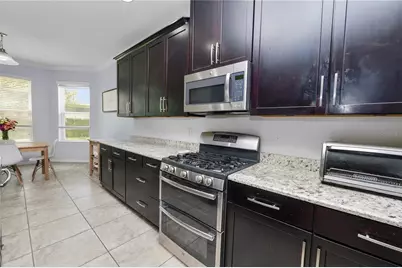8775 Sentiero Drive, Land O Lakes, FL 34637 - Photo 30